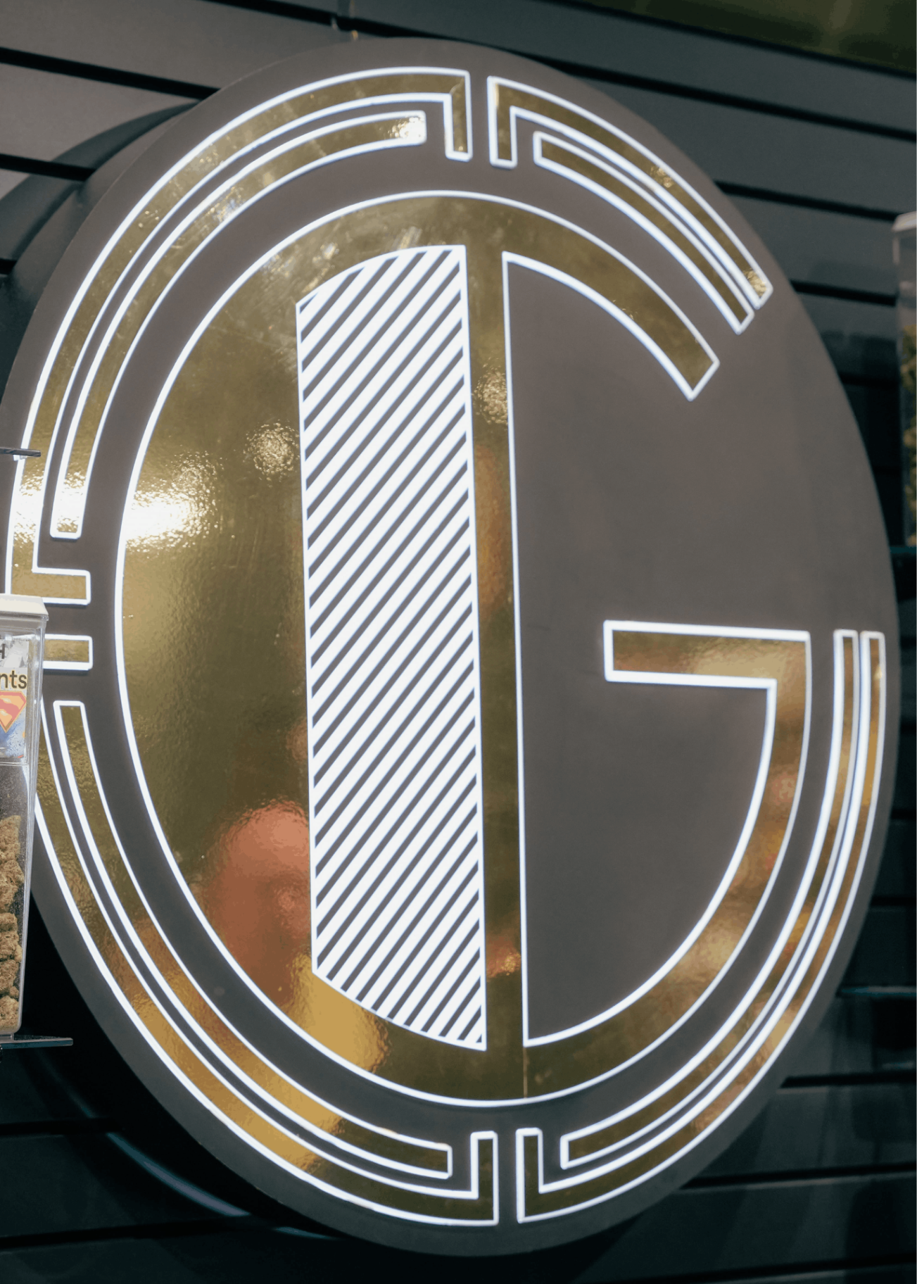Gatsby Cannabis gold G logo signage